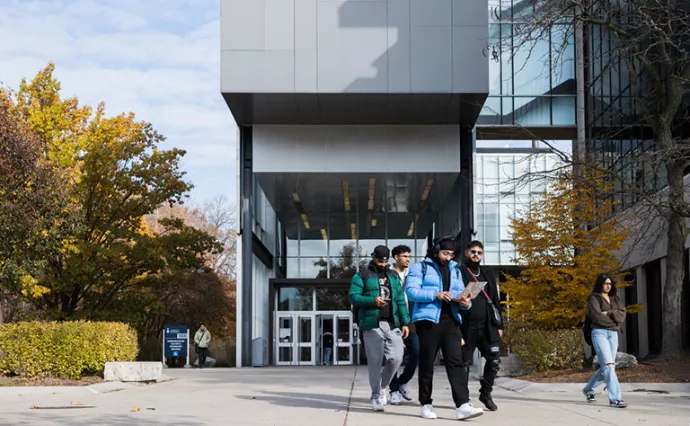 Students walk to class on a crisp fall day at UTM